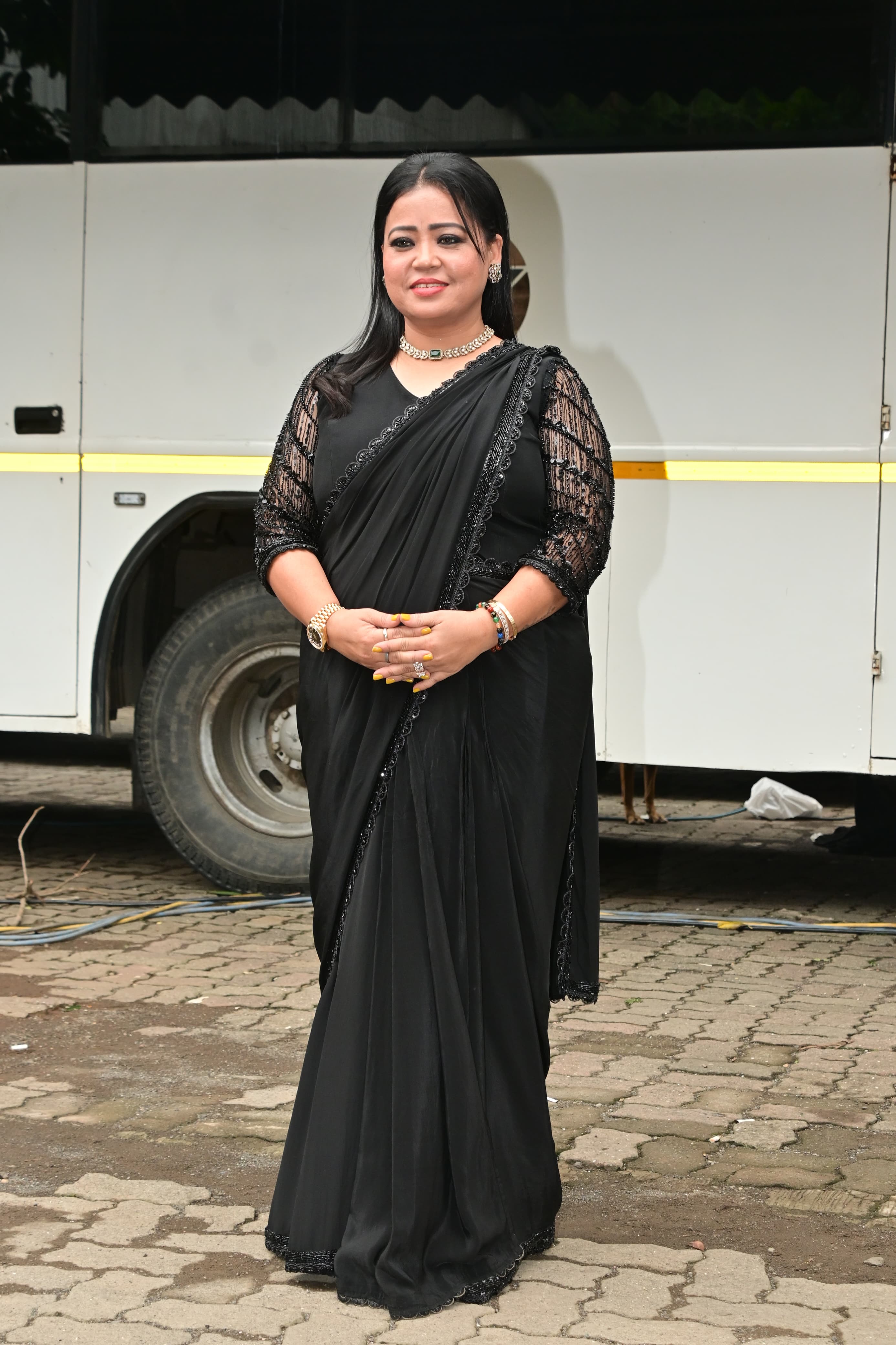 Laughter queen Bharti Singh draped a elegant black saree for the finale episode shoot of her show Laughter Chefs.